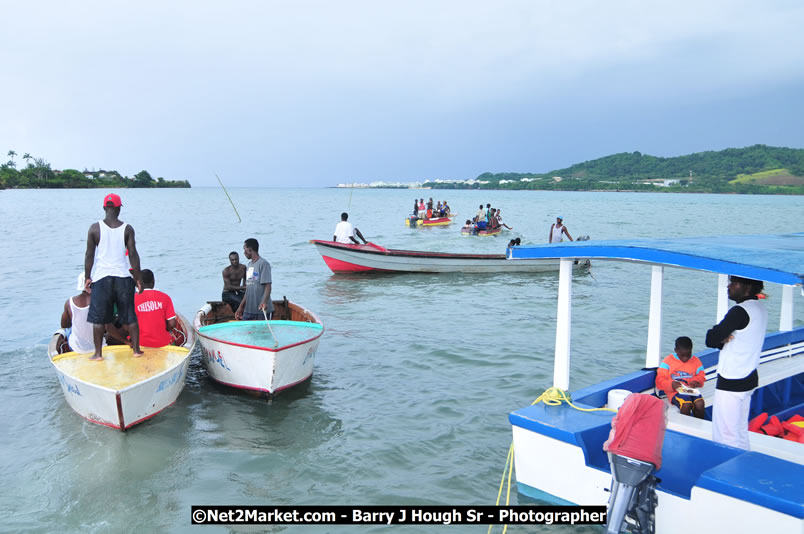 Lucea Cross the Harbour @ Lucea Car Park - All Day Event - Cross the Harbour Swim, Boat Rides, and Entertainment for the Family - Concert Featuring: Bushman, George Nooksl, Little Hero, Bushi One String, Dog Rice and many local Artists - Friday, August 1, 2008 - Lucea, Hanover Jamaica - Photographs by Net2Market.com - Barry J. Hough Sr. Photojournalist/Photograper - Photographs taken with a Nikon D300 - Negril Travel Guide, Negril Jamaica WI - http://www.negriltravelguide.com - info@negriltravelguide.com...!