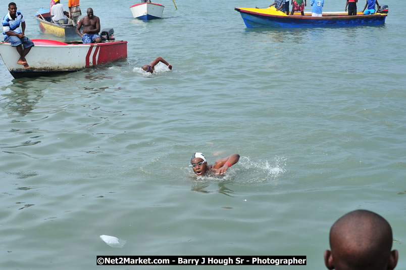 Lucea Cross the Harbour @ Lucea Car Park - All Day Event - Cross the Harbour Swim, Boat Rides, and Entertainment for the Family - Concert Featuring: Bushman, George Nooksl, Little Hero, Bushi One String, Dog Rice and many local Artists - Friday, August 1, 2008 - Lucea, Hanover Jamaica - Photographs by Net2Market.com - Barry J. Hough Sr. Photojournalist/Photograper - Photographs taken with a Nikon D300 - Negril Travel Guide, Negril Jamaica WI - http://www.negriltravelguide.com - info@negriltravelguide.com...!