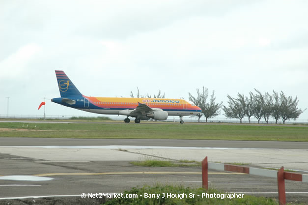 Air Jamaica Airline - Landing & Take Off - MBJ Airports Limited - Sangster International Airport - Domestic Terminal - Montego Bay, St James, Jamaica W.I. - MBJ Limited - Transforming Sangster International Airport into a world class facility - Photographs by Net2Market.com - Negril Travel Guide, Negril Jamaica WI - http://www.negriltravelguide.com - info@negriltravelguide.com...!