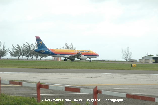 Air Jamaica Airline - Landing & Take Off - MBJ Airports Limited - Sangster International Airport - Domestic Terminal - Montego Bay, St James, Jamaica W.I. - MBJ Limited - Transforming Sangster International Airport into a world class facility - Photographs by Net2Market.com - Negril Travel Guide, Negril Jamaica WI - http://www.negriltravelguide.com - info@negriltravelguide.com...!