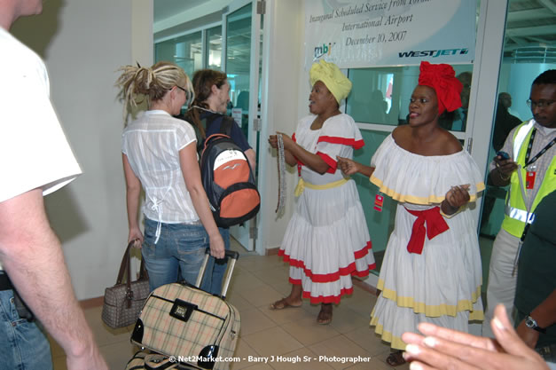 MBJ Airports Limited Welcomes WestJet Airlines - Inaugural Scheduled Service From Toronto Pearsons International Airport - Monday, December 10, 2007 - Sangster International Airport - MBJ Airports Limited, Montego Bay, Jamaica W.I. - Photographs by Net2Market.com - Barry J. Hough Sr, Photographer - Negril Travel Guide, Negril Jamaica WI - http://www.negriltravelguide.com - info@negriltravelguide.com...!