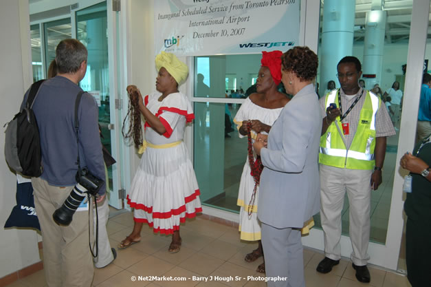 MBJ Airports Limited Welcomes WestJet Airlines - Inaugural Scheduled Service From Toronto Pearsons International Airport - Monday, December 10, 2007 - Sangster International Airport - MBJ Airports Limited, Montego Bay, Jamaica W.I. - Photographs by Net2Market.com - Barry J. Hough Sr, Photographer - Negril Travel Guide, Negril Jamaica WI - http://www.negriltravelguide.com - info@negriltravelguide.com...!