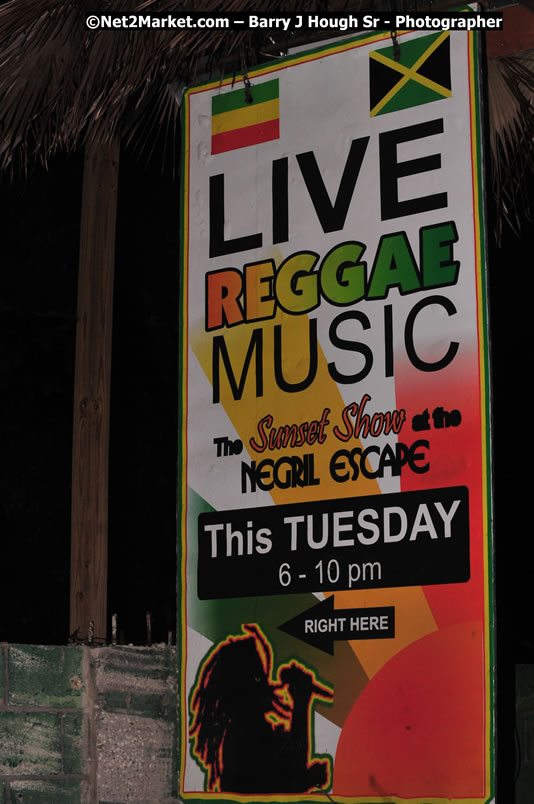 Chinese New Year @ The Sunset Show at Negril Escape - Tuesday, January 27, 2009 - Live Reggae Music at Negril Escape - Tuesday Nights 6:00PM to 10:00 PM - Photographs by Net2Market.com - Barry J. Hough Sr, Photographer/Photojournalist - Negril Travel Guide, Negril Jamaica WI - http://www.negriltravelguide.com - info@negriltravelguide.com...!