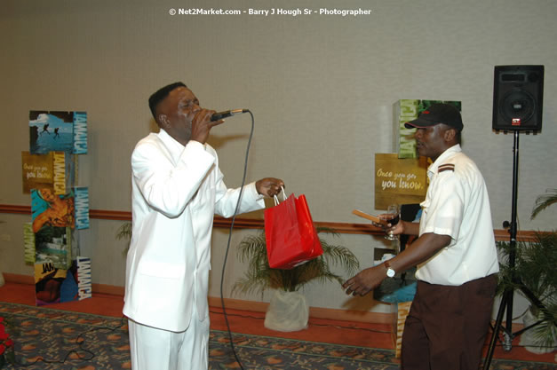 Red Cap Porters Awards - Minister of Tourism, Hon. Edmund Bartlett - Director of Tourism, Basil Smith - Friday, December 14, 2007 - Holiday Inn Sunspree, Montego Bay, Jamaica W.I. - Photographs by Net2Market.com - Barry J. Hough Sr, Photographer - Negril Travel Guide, Negril Jamaica WI - http://www.negriltravelguide.com - info@negriltravelguide.com...!